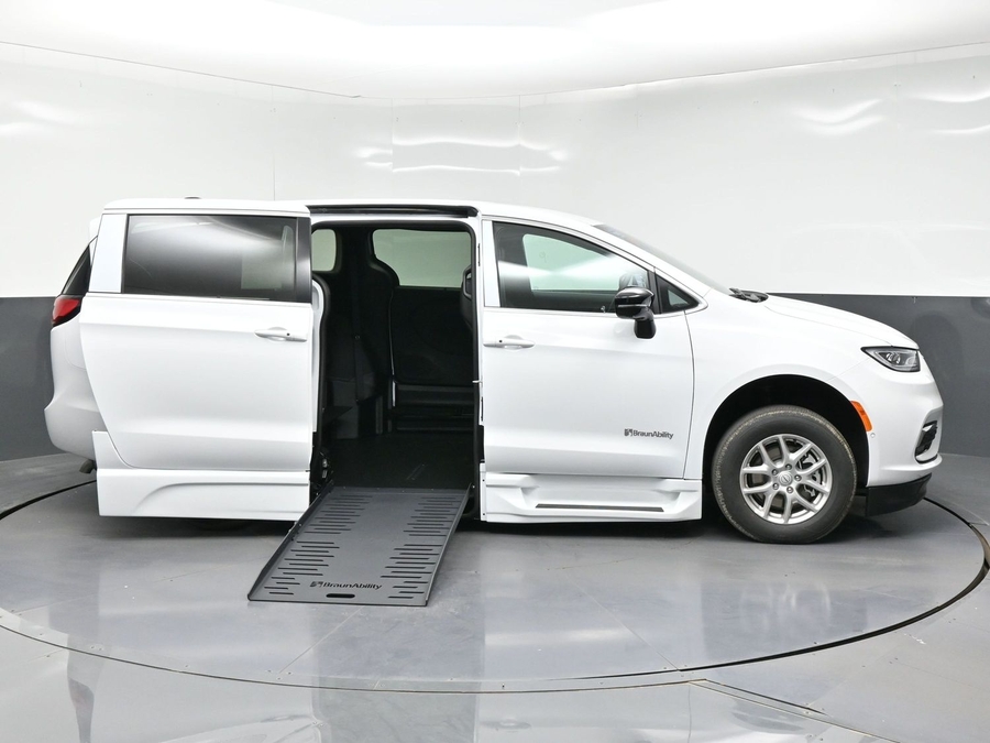 White Chrysler Pacifica with Side Entry Automatic Fold Out ramp