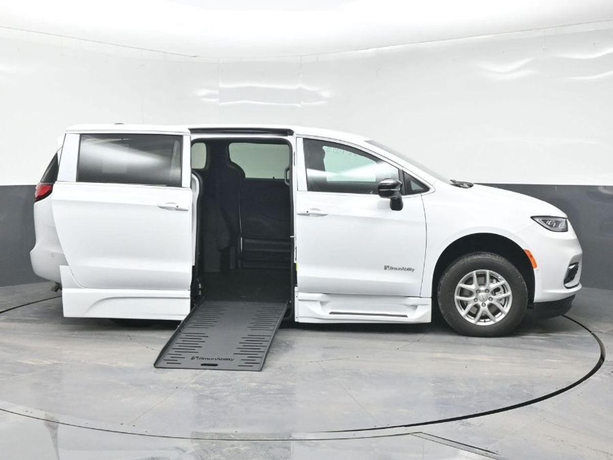 White Chrysler Pacifica with Side Entry Automatic Fold Out ramp