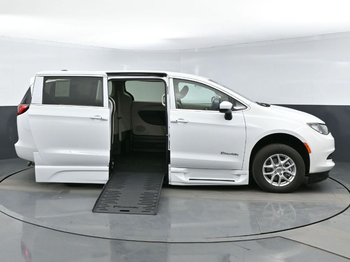 White Chrysler Voyager with Side Entry Automatic Fold Out ramp