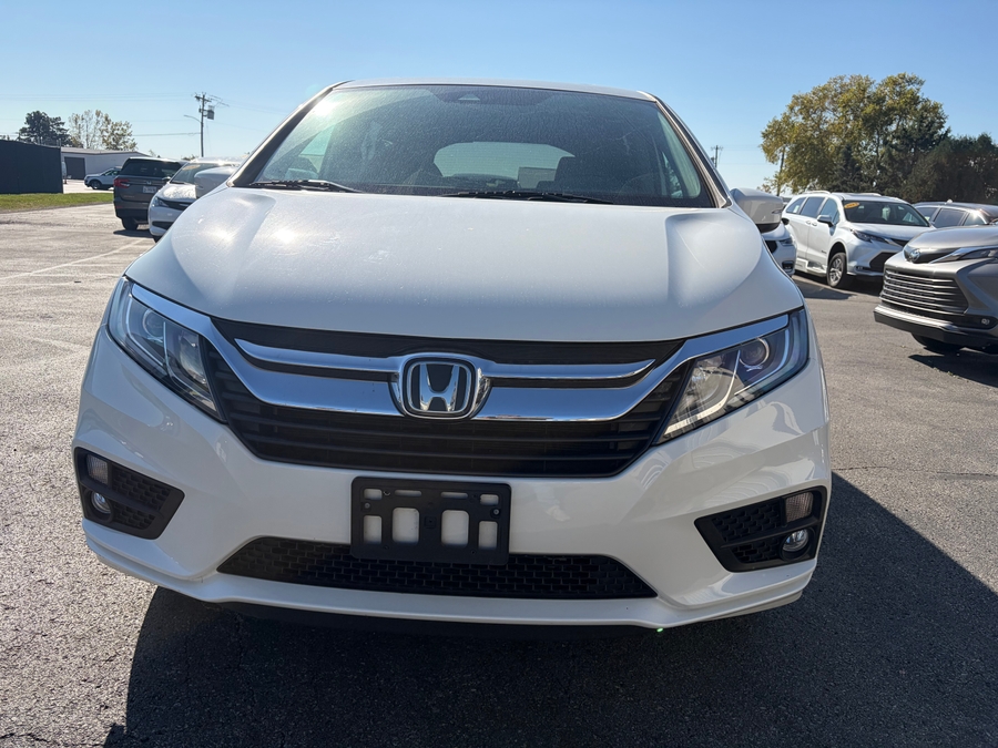 White Honda Odyssey with Side Entry Automatic In Floor ramp