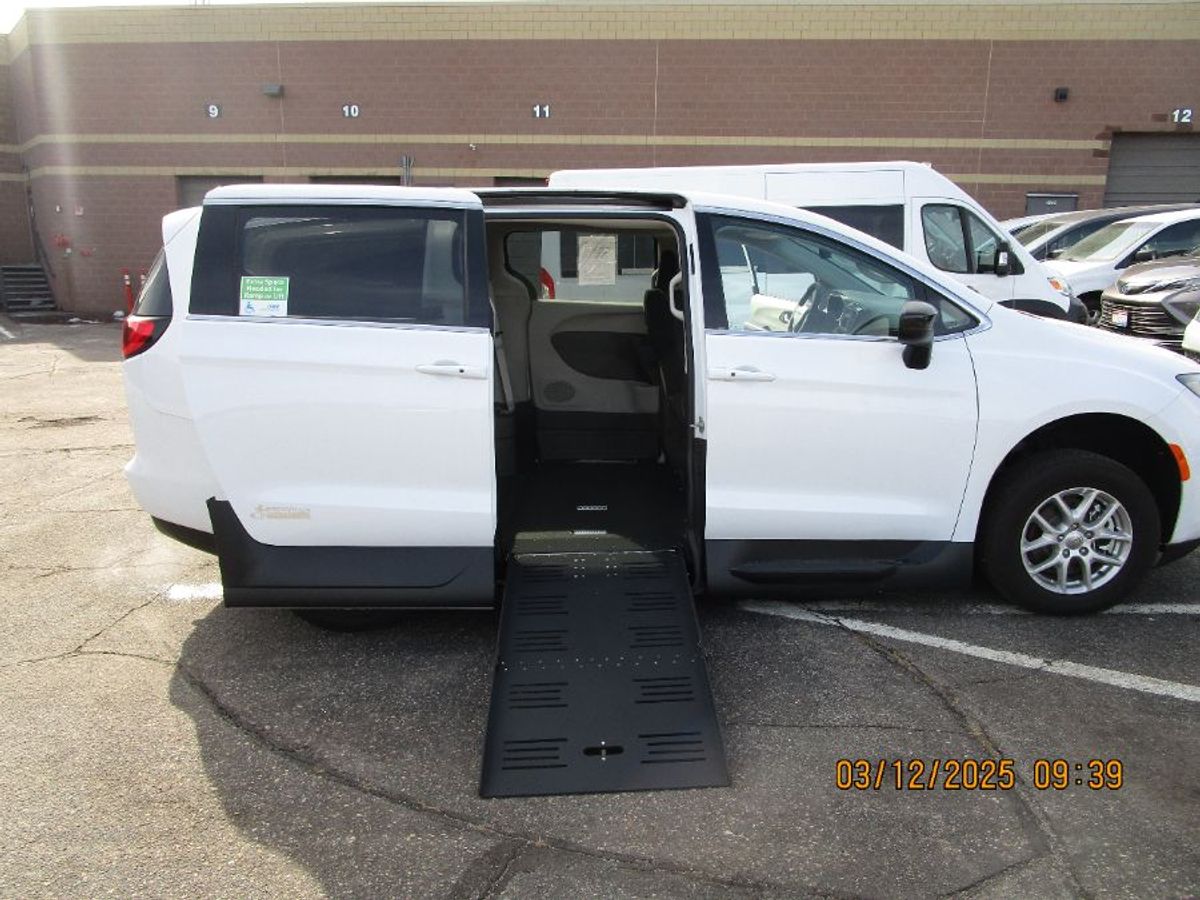 White Chrysler Voyager with Side Entry Automatic Fold Out ramp