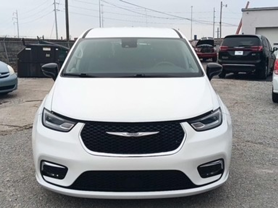 White Chrysler Pacifica with Rear Entry Manual Fold Out ramp