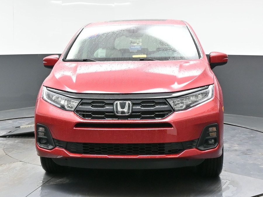 Red Honda Odyssey image number 9