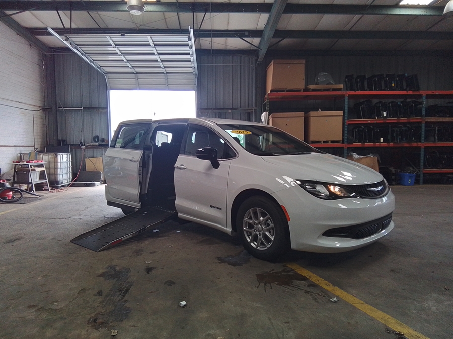 White Chrysler Voyager with Side Entry Automatic Fold Out ramp