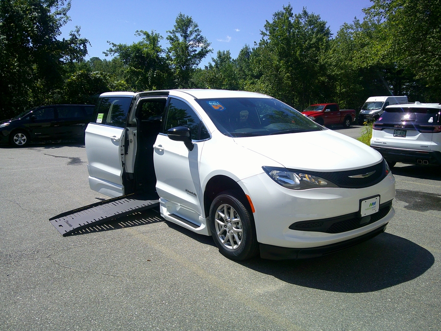 White Chrysler Voyager with Side Entry Automatic Fold Out ramp