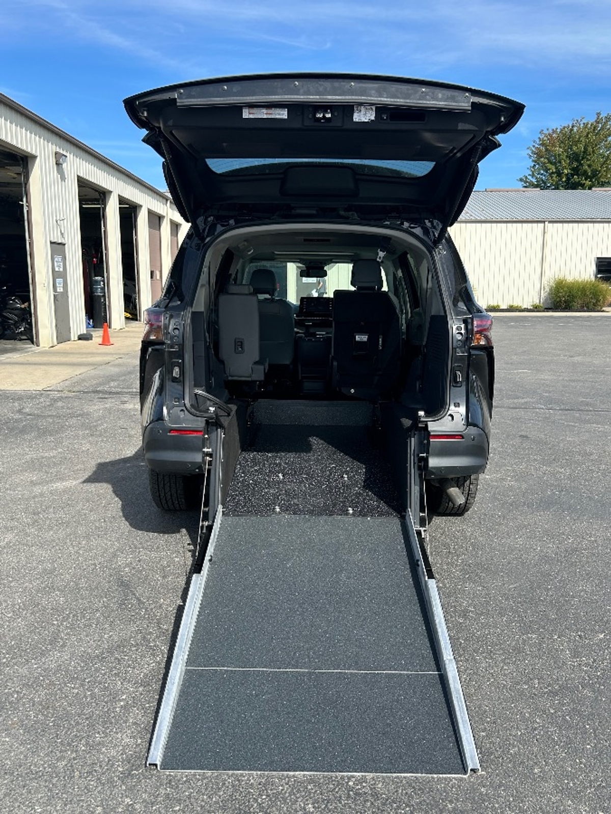 Black Toyota Sienna with Rear Entry Manual Fold Out ramp