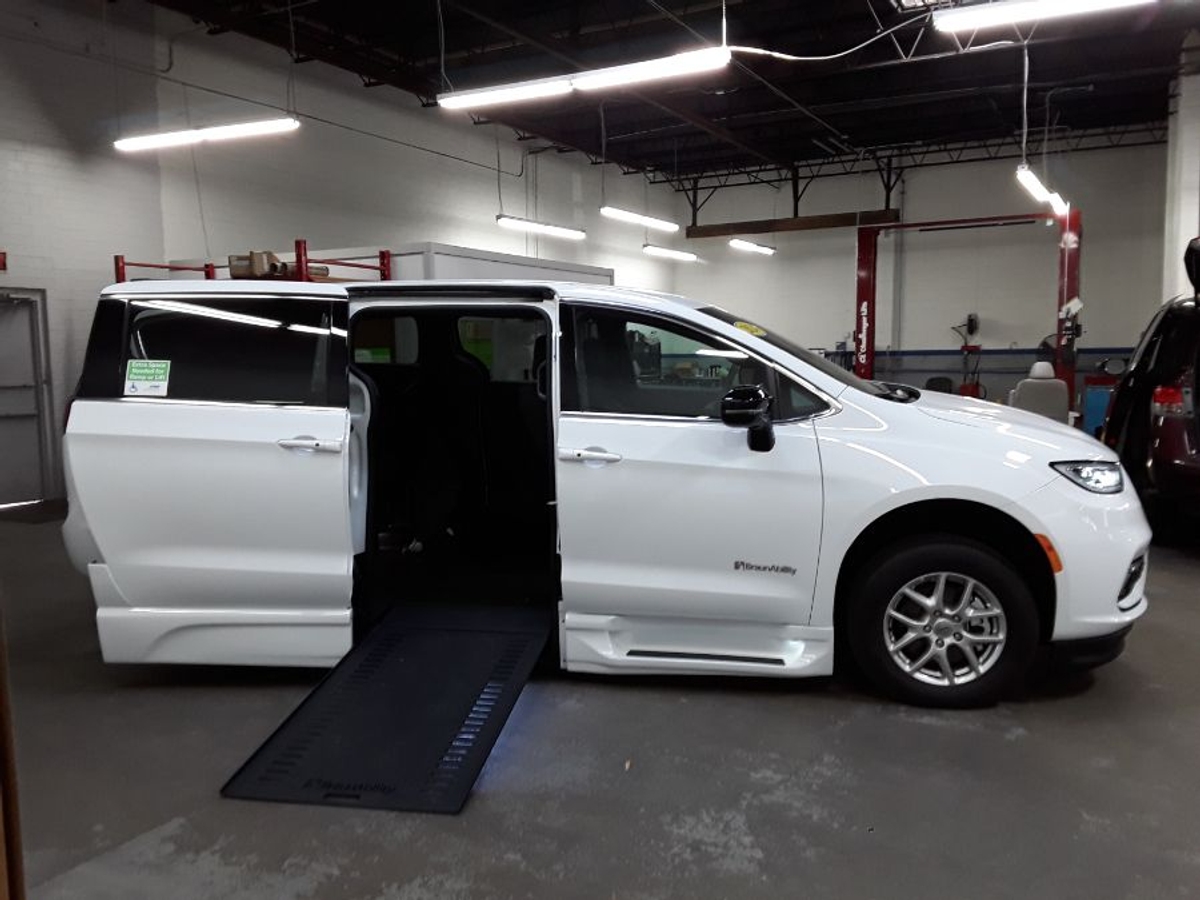White Chrysler Pacifica with Side Entry Automatic In Floor ramp