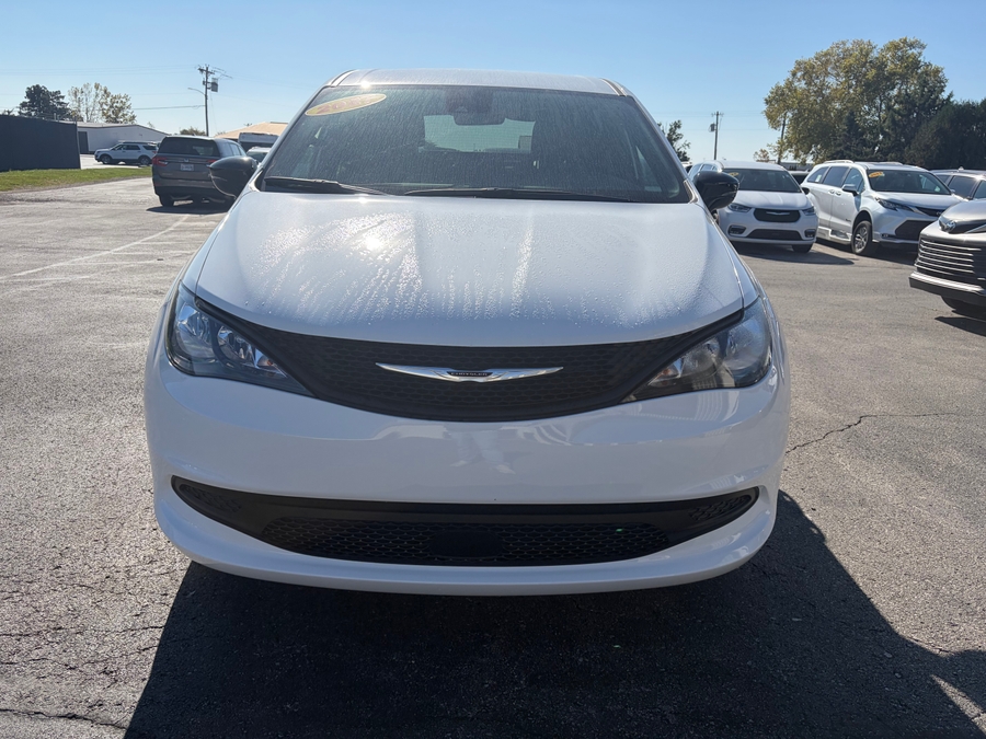 White Chrysler Pacifica with Rear Entry Manual Fold Out ramp