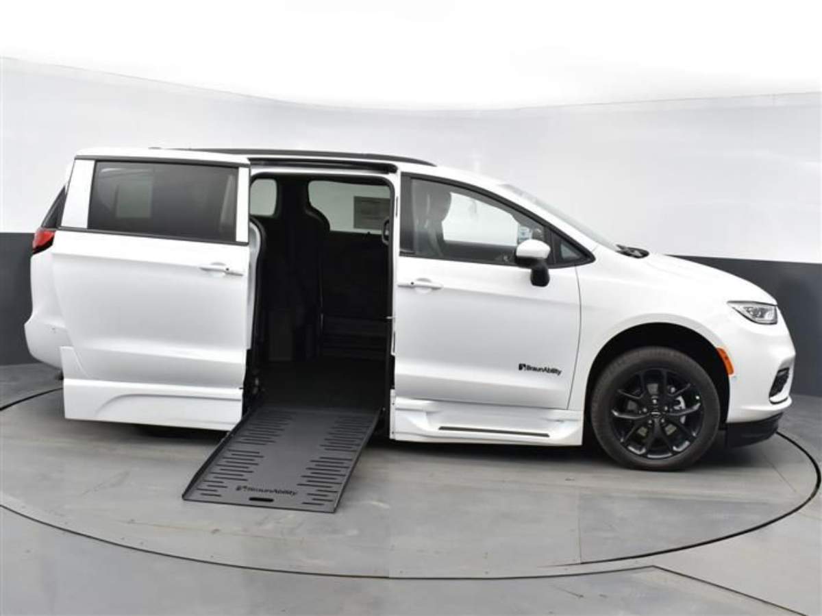 White Chrysler Pacifica with Side Entry Automatic Fold Out ramp