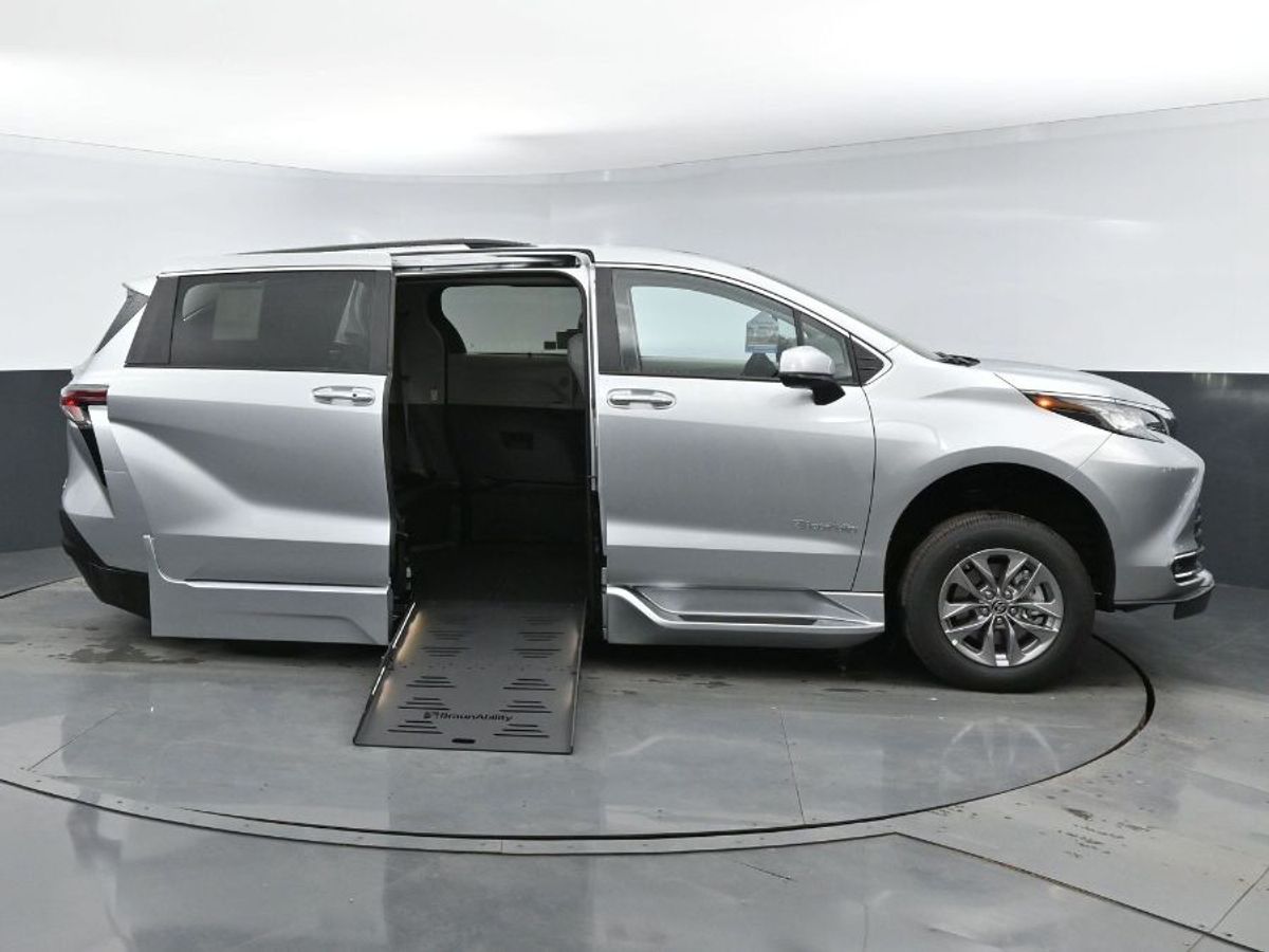 Silver Toyota Sienna with Side Entry Automatic Fold Out ramp