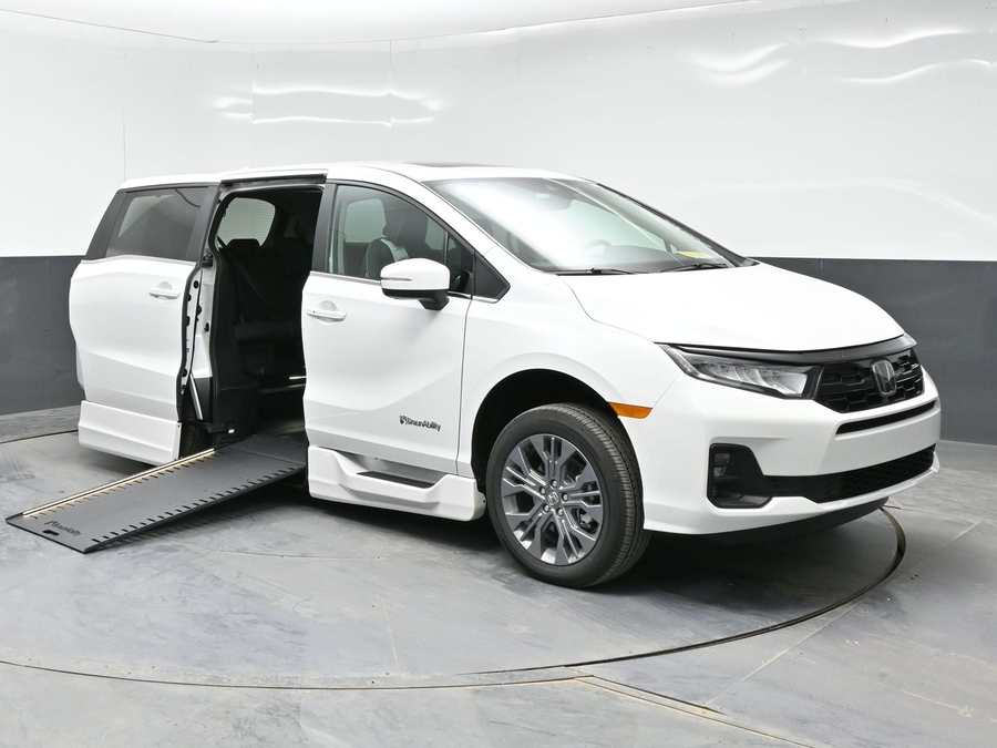 White Honda Odyssey with Side Entry Automatic In Floor ramp