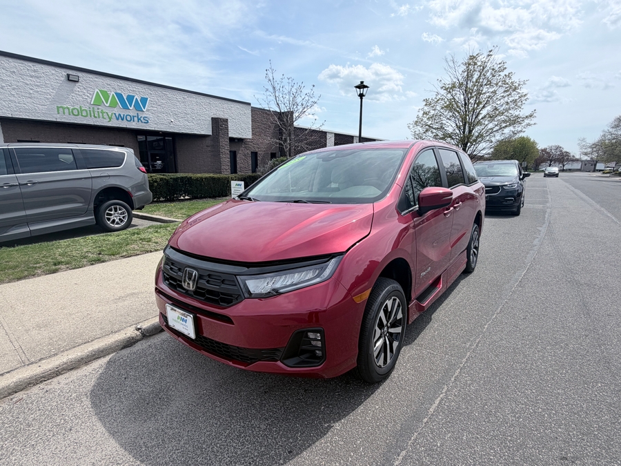 Red Honda Odyssey with Side Entry Automatic In Floor ramp