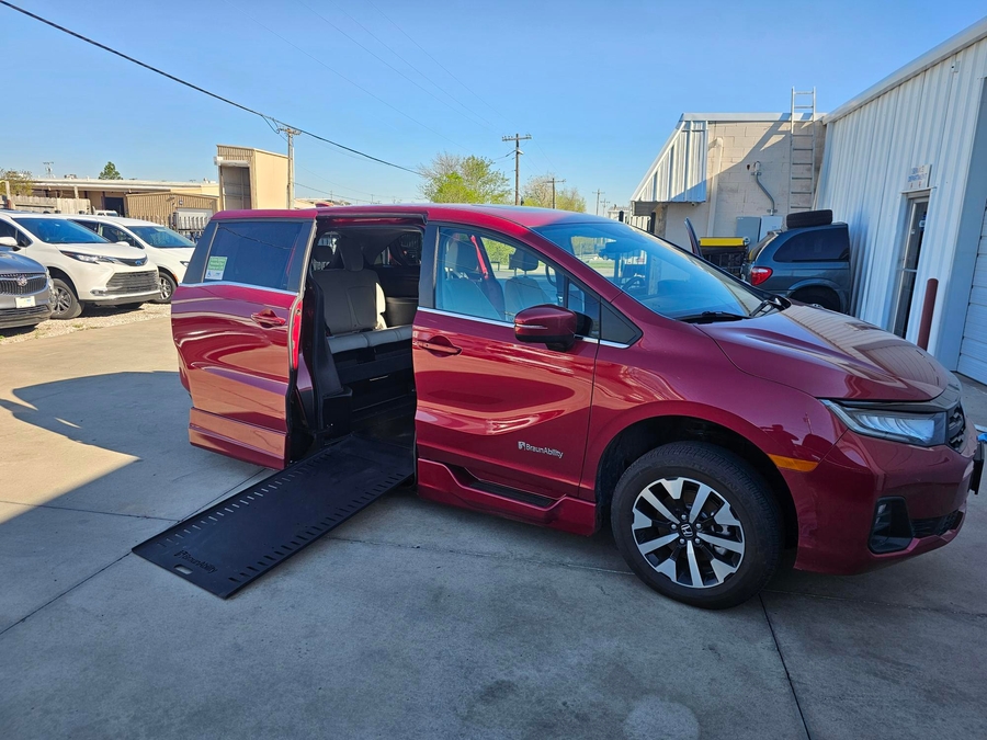 Red Honda Odyssey with Side Entry Automatic In Floor ramp