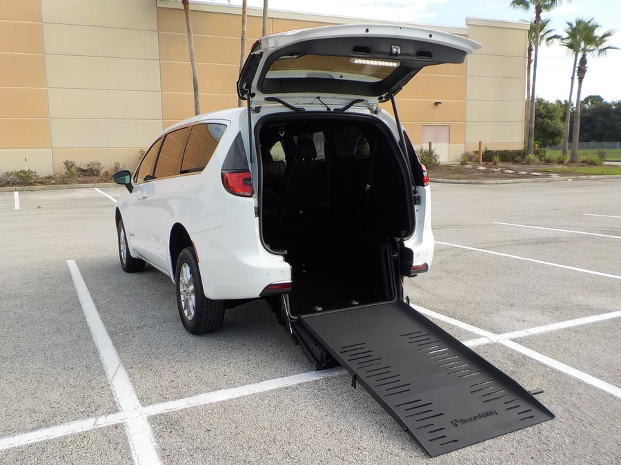 White Chrysler Pacifica with Rear Entry Manual Fold Out ramp