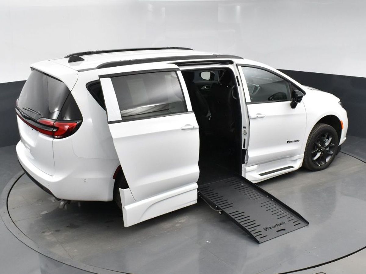 White Chrysler Pacifica with Side Entry Automatic Fold Out ramp