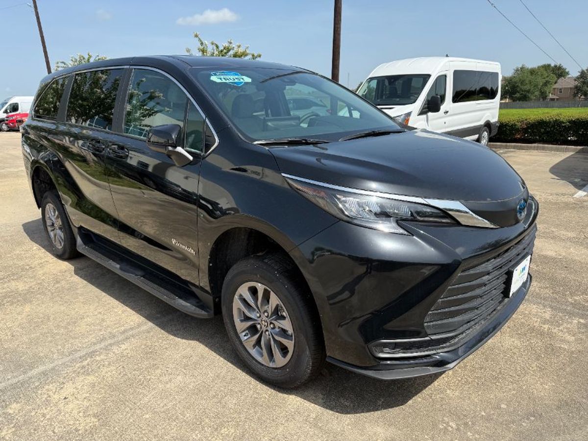 Black Toyota Sienna with Rear Entry Manual Fold Out ramp