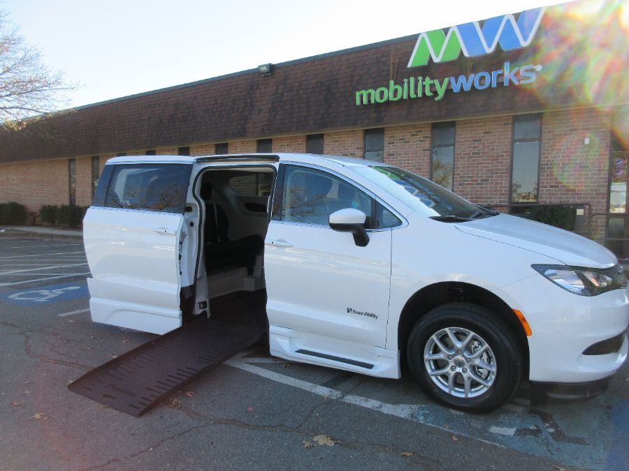 White Chrysler Voyager with Side Entry Automatic Fold Out ramp
