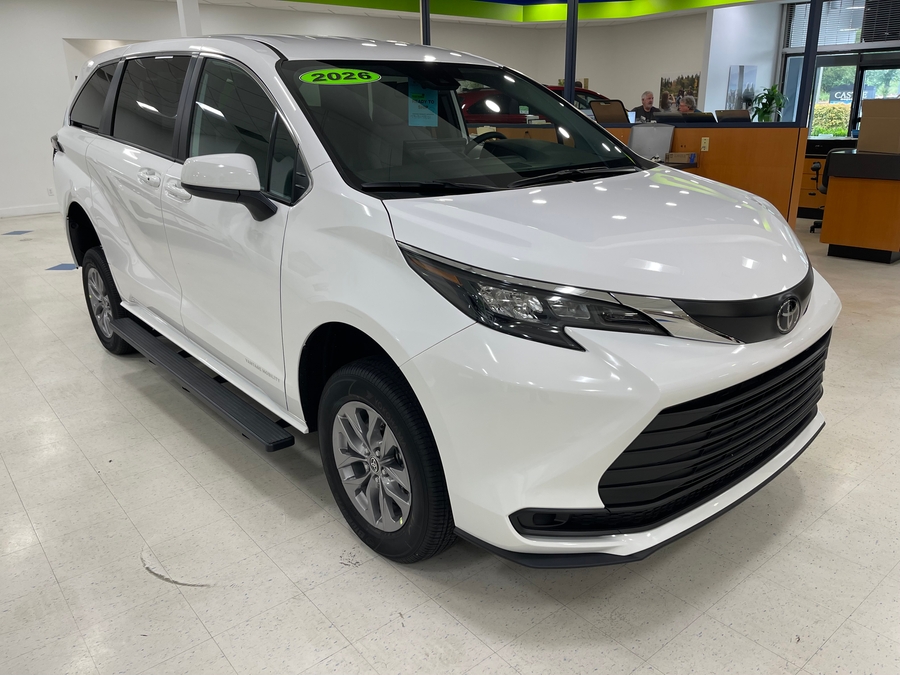 White Toyota Sienna with Rear Entry Manual Fold Out ramp
