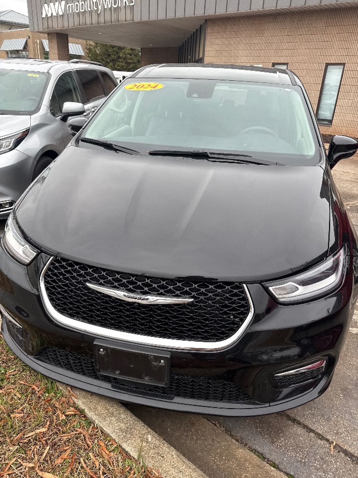 Black Chrysler Pacifica with Side Entry Automatic Fold Out ramp