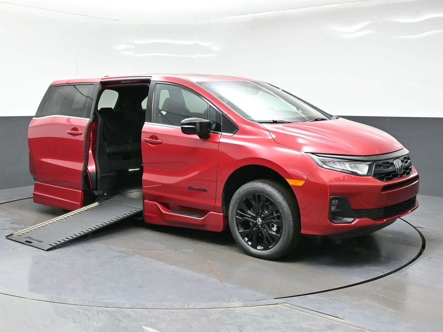 Red Honda Odyssey image number 4