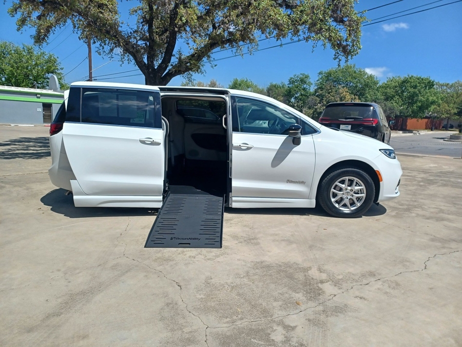 White Chrysler Pacifica with Side Entry Automatic Fold Out ramp