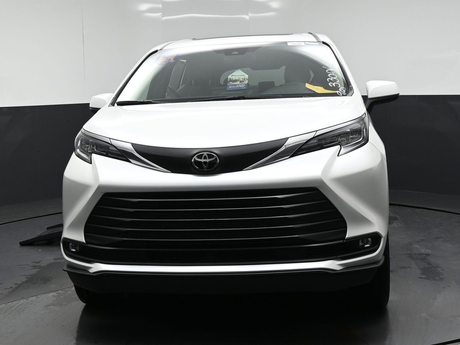 White Toyota Sienna with Side Entry Automatic Fold Out ramp