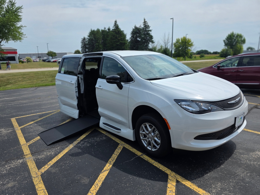 White Chrysler Voyager with Side Entry Automatic In Floor ramp