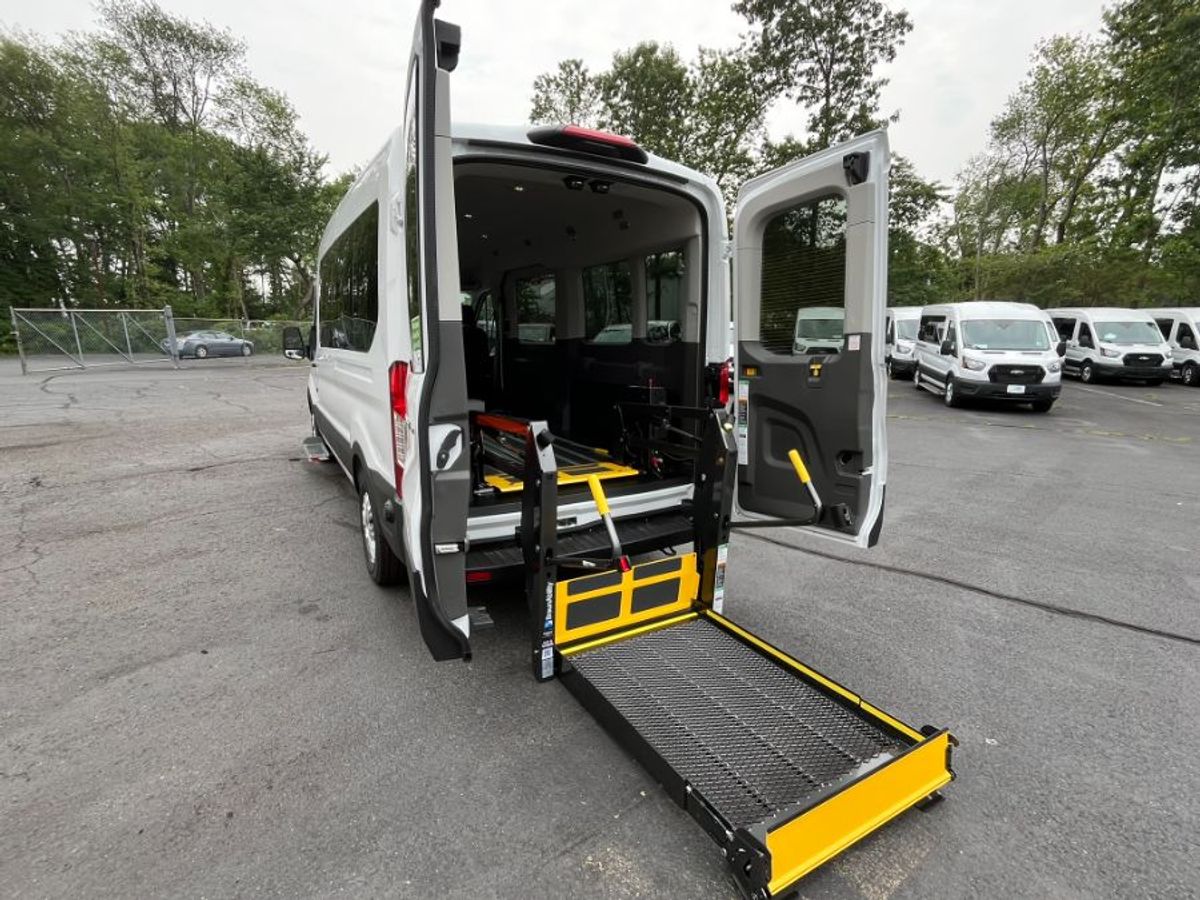 White Ford T350 with Rear Entry Automatic Fold Out ramp