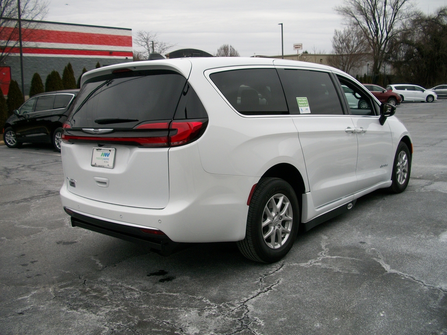 White Chrysler Pacifica with Side Entry Automatic Fold Out ramp