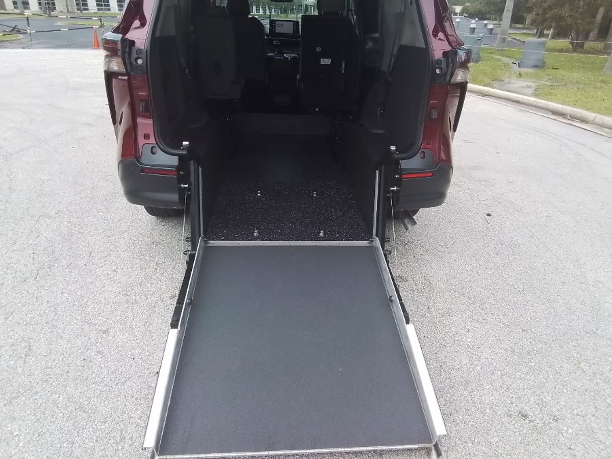Red Toyota Sienna with Rear Entry Manual Fold Out ramp