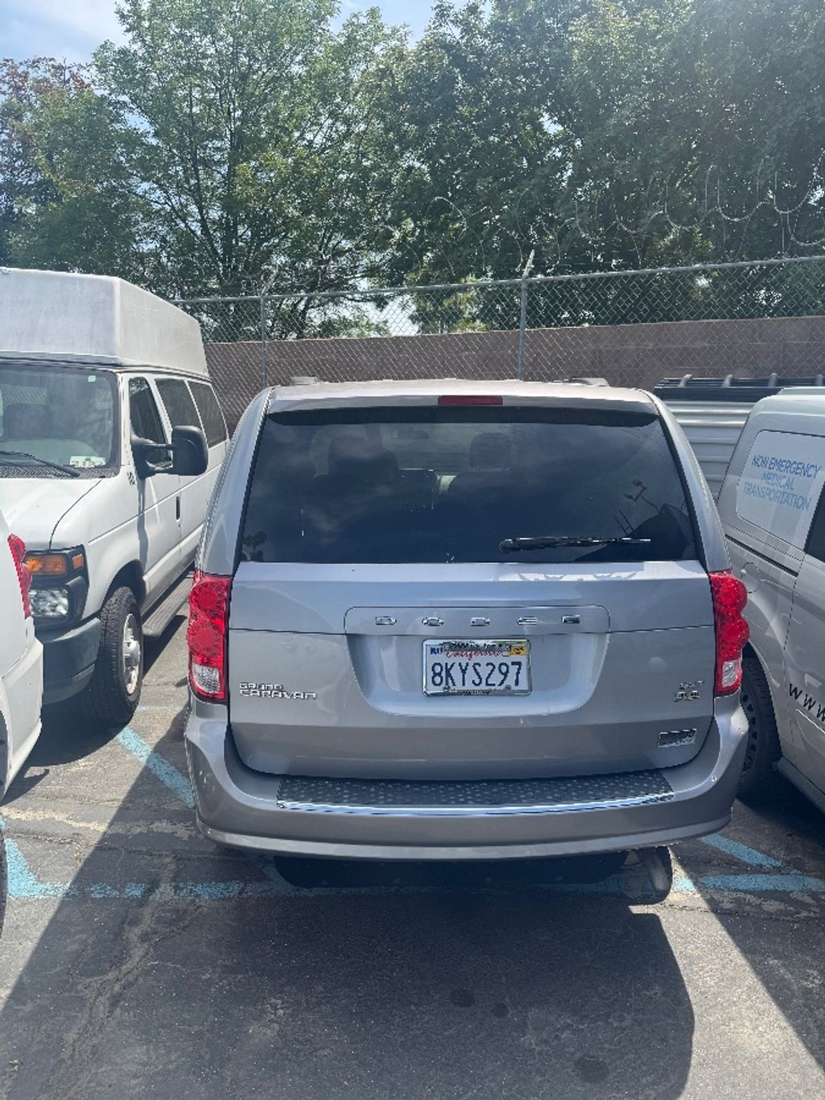 Silver Dodge Grand Caravan image number 6