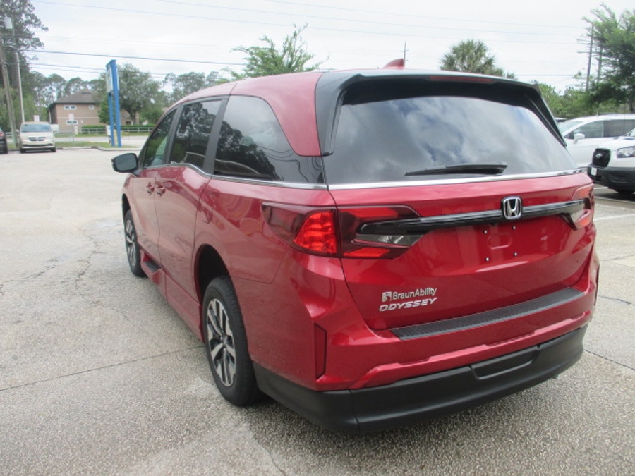 Red Honda Odyssey with Side Entry Automatic In Floor ramp