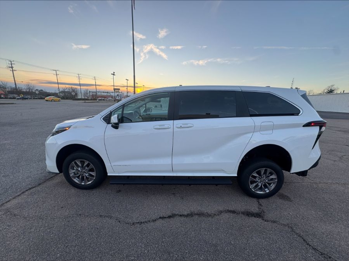 White Toyota Sienna with Rear Entry Manual Fold Out ramp