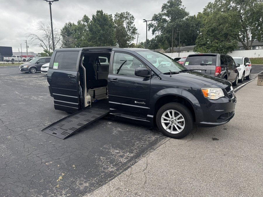 Blue Dodge Grand Caravan with Side Entry Automatic Fold Out ramp