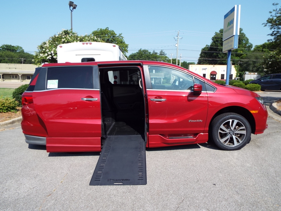 Red Honda Odyssey with Side Entry Automatic In Floor ramp