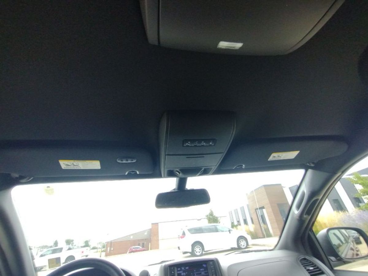 Red Dodge Grand Caravan with Side Entry Automatic Fold Out ramp