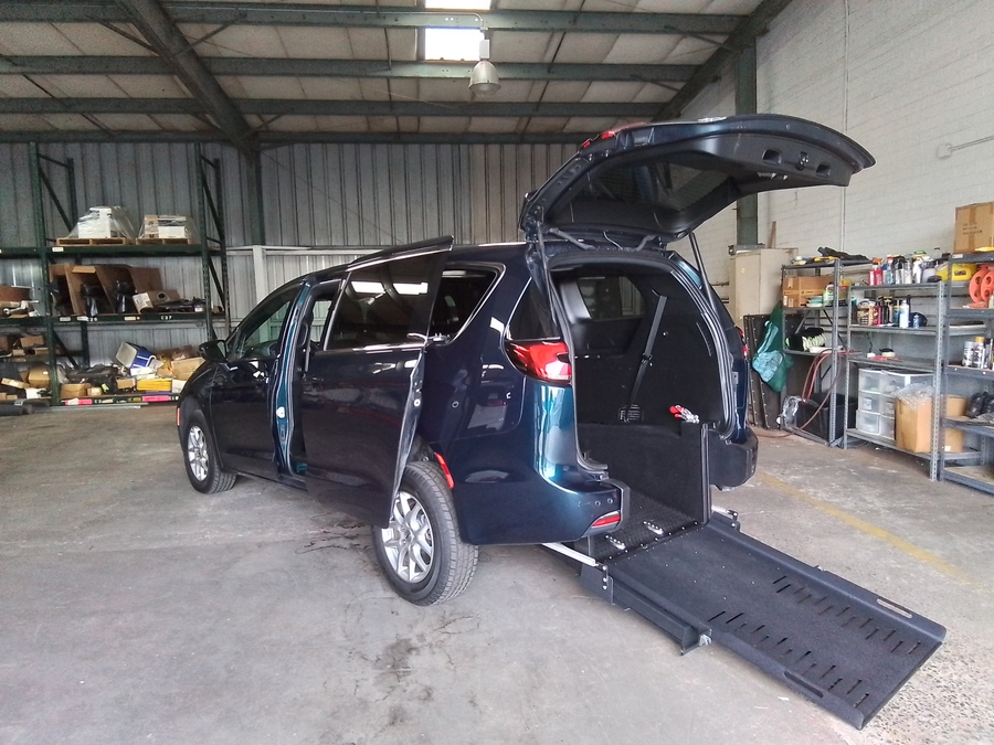 Blue Chrysler Pacifica with Rear Entry Manual Fold Out ramp