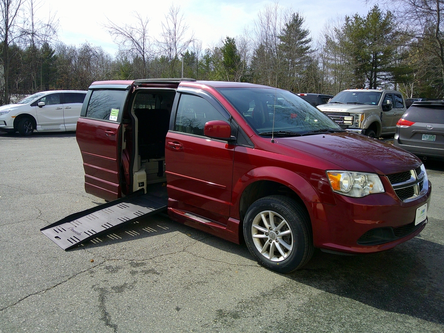Red Dodge Grand Caravan with Side Entry Automatic Fold Out ramp