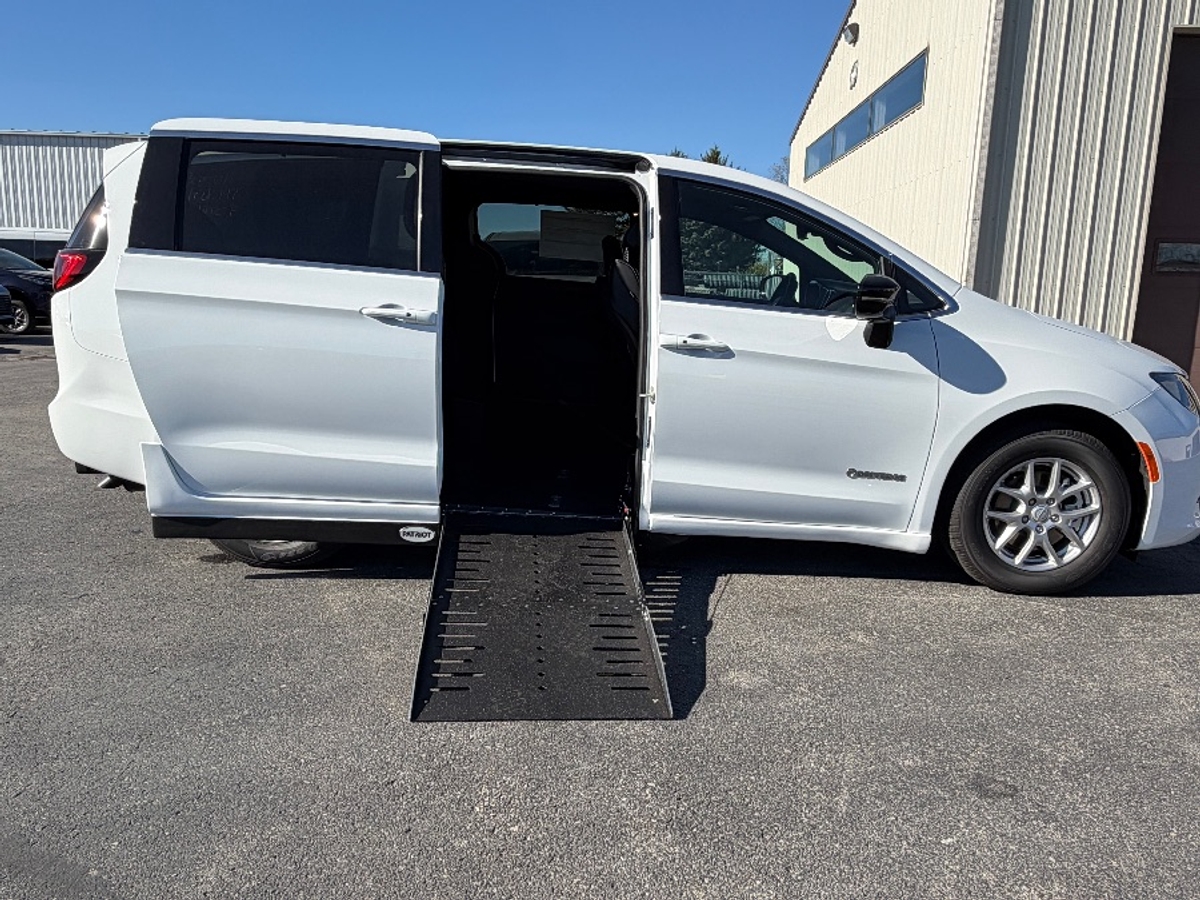 White Chrysler Voyager with Side Entry Automatic Fold Out ramp