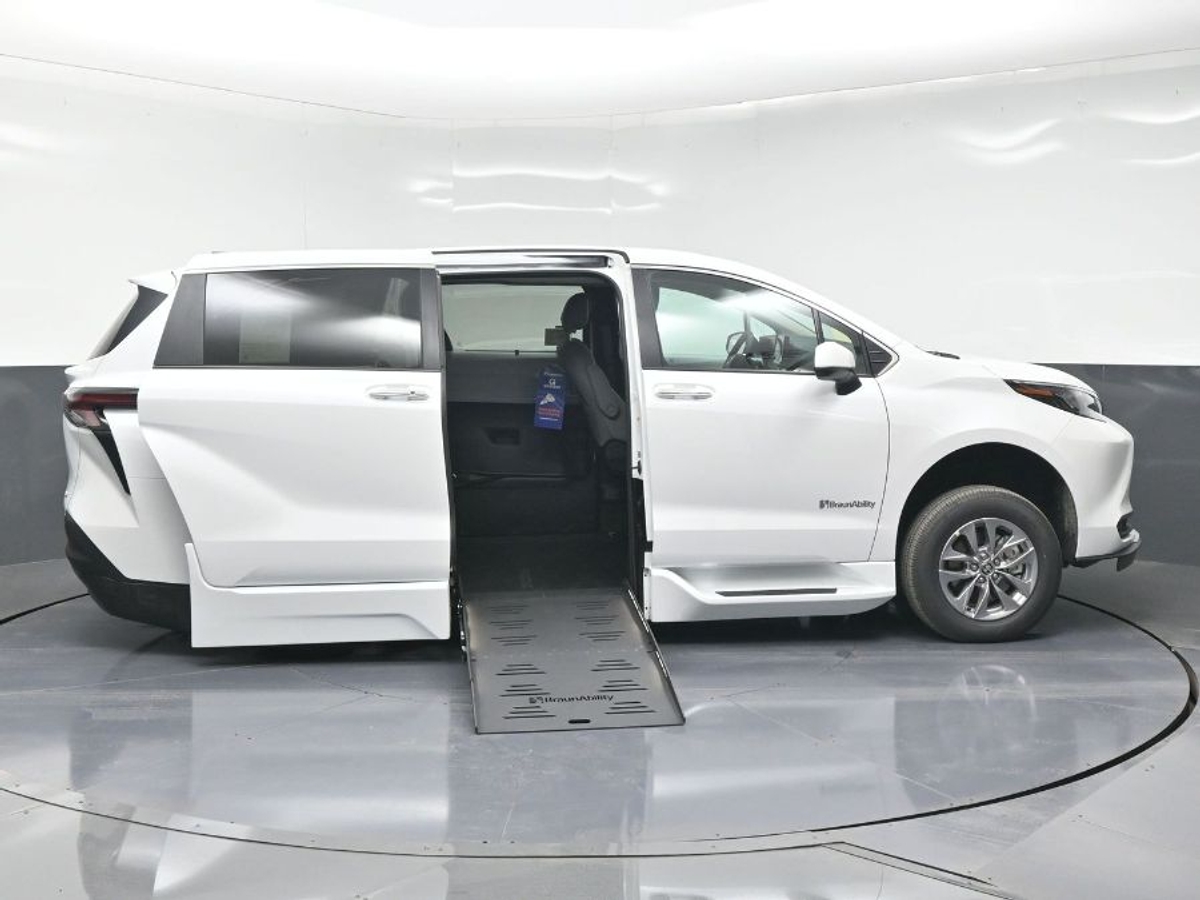 White Toyota Sienna with Side Entry Automatic Fold Out ramp