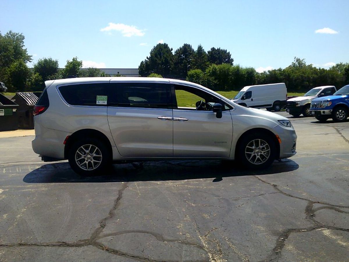 Silver Chrysler Pacifica with Rear Entry Manual Fold Out ramp