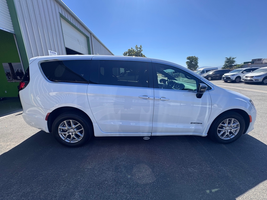 White Chrysler Voyager with Side Entry Automatic Fold Out ramp