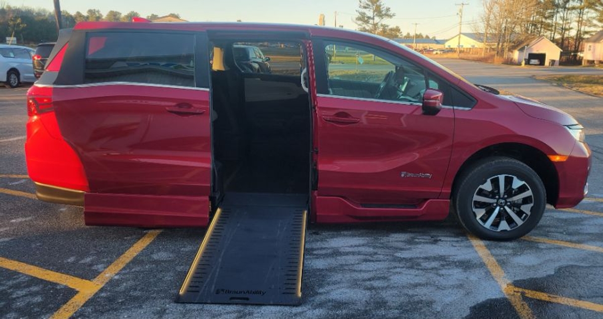 Red Honda Odyssey with Side Entry Automatic In Floor ramp