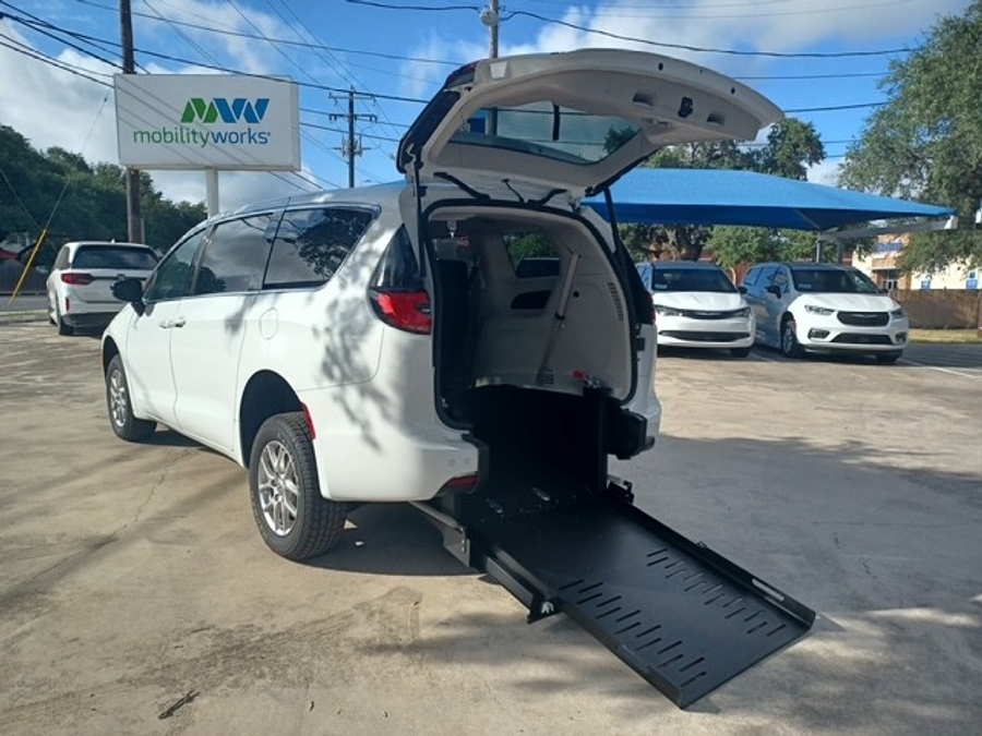 White Chrysler Pacifica with Rear Entry Manual Fold Out ramp