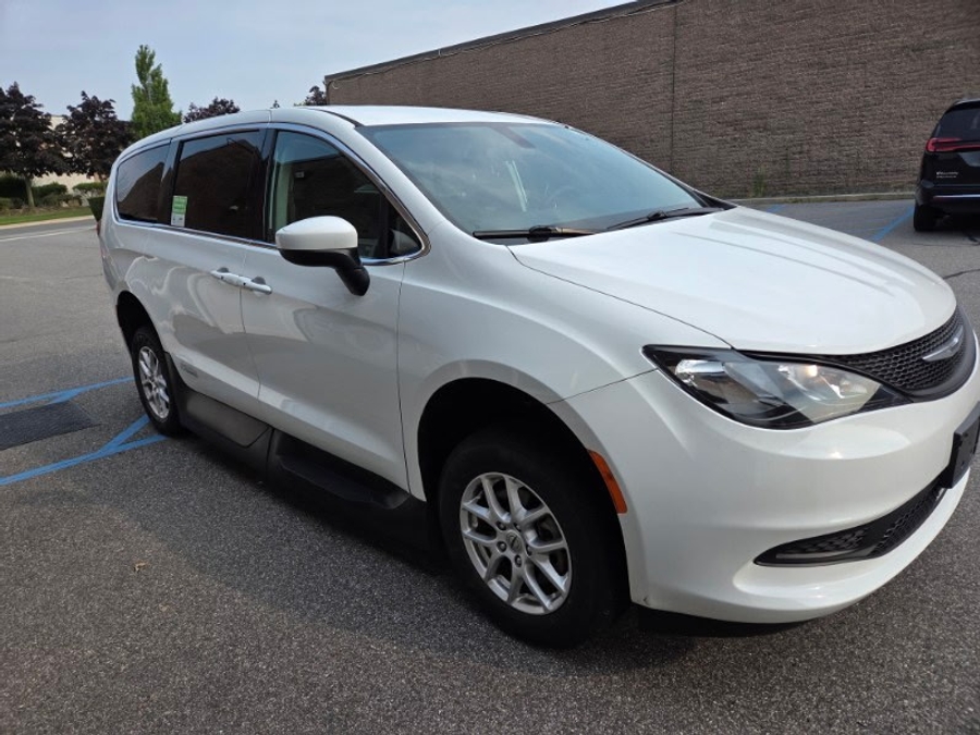 White Chrysler Voyager with Side Entry Automatic Fold Out ramp