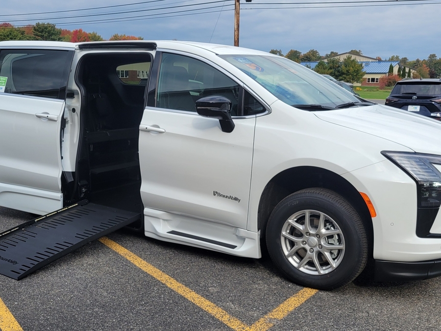 White Chrysler Pacifica with Side Entry Automatic Fold Out ramp