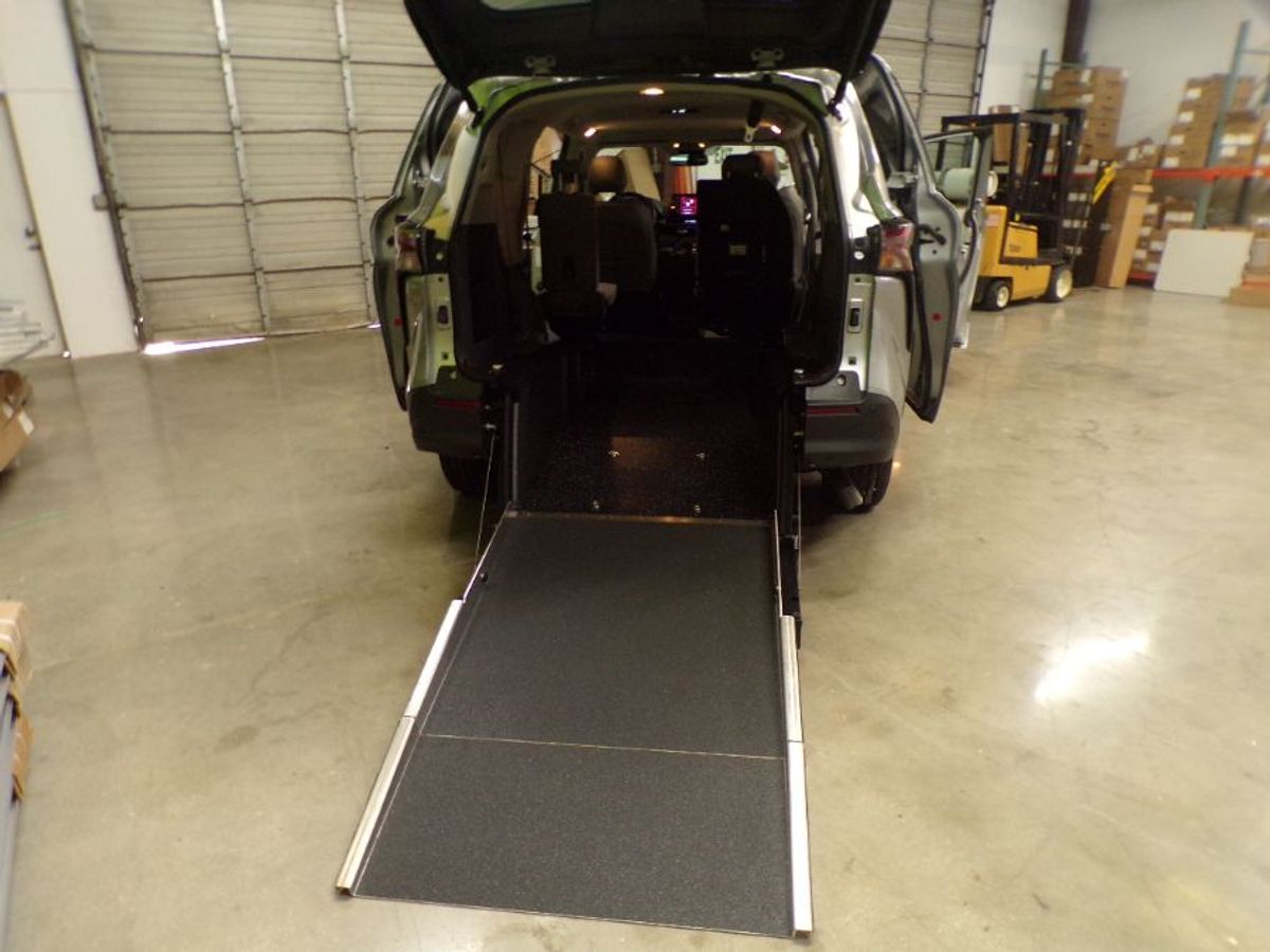 Silver Toyota Sienna with Rear Entry Manual Fold Out ramp
