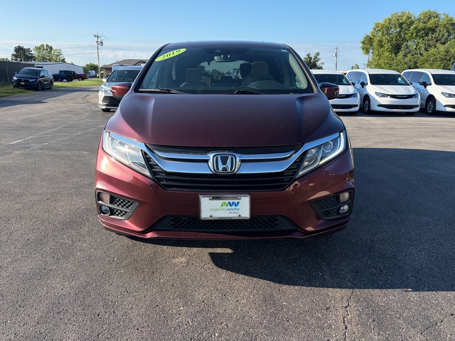 Red Honda Odyssey with Side Entry Automatic In Floor ramp