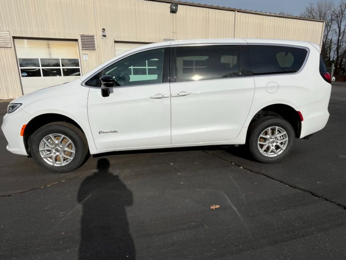 White Chrysler Pacifica with Rear Entry Manual Fold Out ramp
