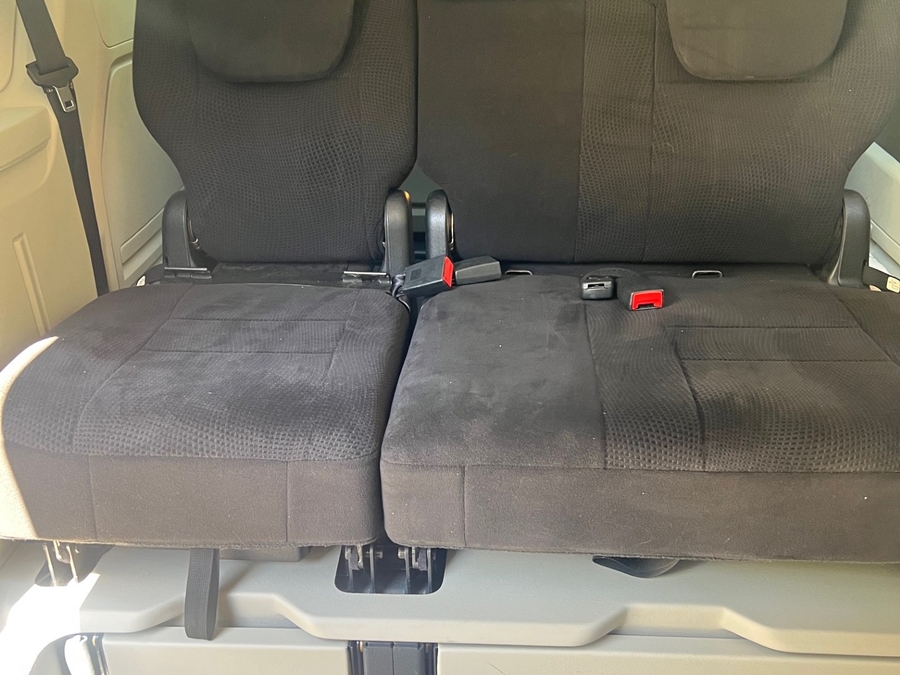 Black Dodge Grand Caravan with Side Entry Automatic Fold Out ramp